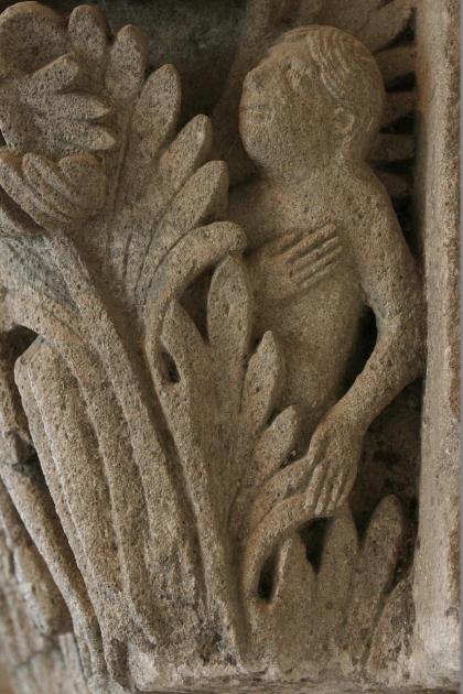 Detail of the dead Abel on a Romanesque capital from the choir, now displayed in the chapter house. It depicts a moment in the biblical story of Cain, who killed his brother Abel out of jealousy. Here God asks Cain where his brother is and he replies, "Am I my brother's keeper?" Cain puts his hand on his hip in a gesture of defiance. Behind him, the feet of Abel's body can be seen sticking out of the bushes, revealing the true answer to God's question. Around the corner on the side of the capital is the rest of Abel, lying among plants with his eyes closed.